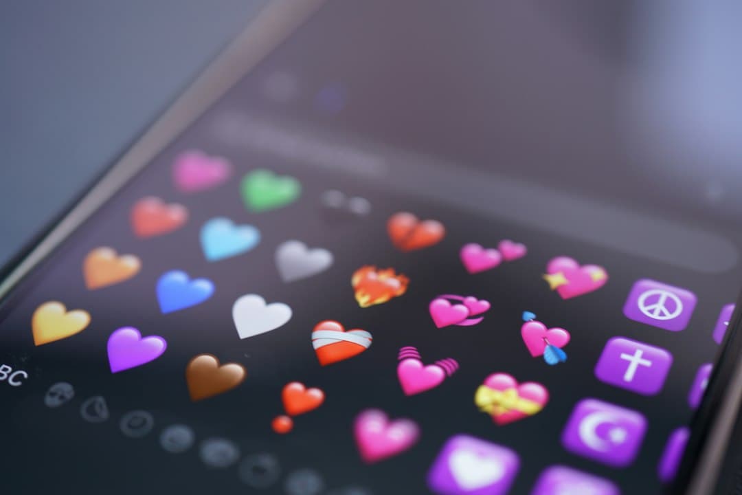 A phone screen showing colorful heart emojis